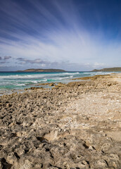 The rocky limestone shore of Observatory beach, looking towards Observatory Island and point, Esperance Western Australia