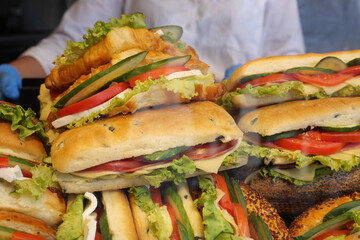 Freshly made sandwiches in a busy market stall