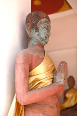 An ancient Buddha statue at a temple in Thailand