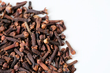 Close-up of dry clove buds isolated on white background
