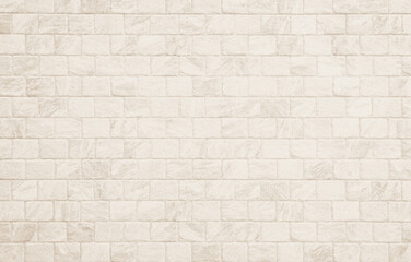 Detail of modern cream brick wall background photo. White light brick wall texture background for...
