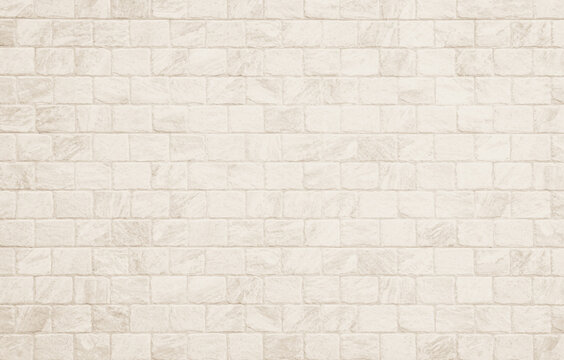 Detail of modern cream brick wall background photo. White light brick wall texture background for stone tile block painted in beige light color wallpaper modern interior and exterior backdrop design.
