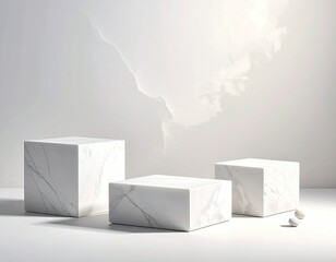 Three marble cubes on plain white surface