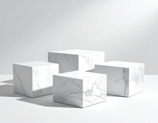 Marble cubes arranged on white surface, bathed in soft light
