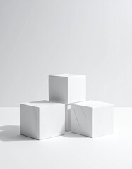 Stacked white cubes cast soft shadows on a white background
