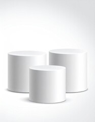 Three white cylinders stand at varying heights on white