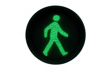 Green pedestrian signal illuminating walk symbol, advising pedestrians it is safe to cross the street