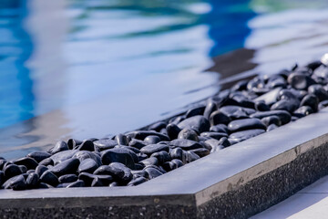 Decorative of the black pebbles in the pool