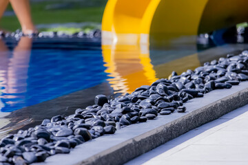 Decorative of the black pebbles in the pool