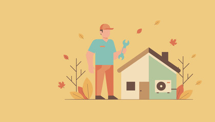 HVAC repairman performing home service during the autumn season