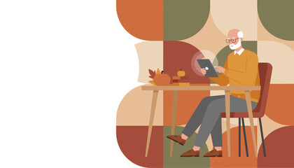 Senior man using tablet in cozy autumnal setting Digital literacy concept