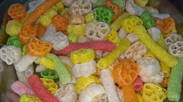 Colorful Fryums Being Fried in Hot Oil &ndash; Crispy Indian Snack Preparation