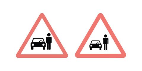 Two triangular road warning signs depicting a car and a person indicating a pedestrian crossing or hazard ahead