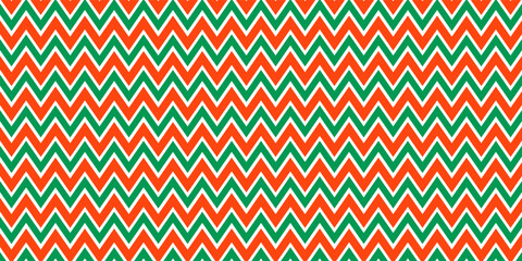Red and green seamless pattern. Candy cane zigzag stripes background