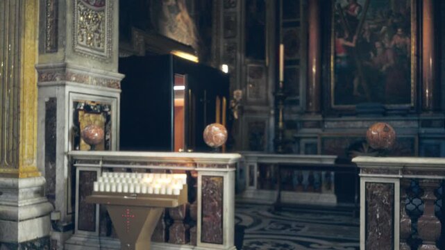 Soft blurred interior of ornate catholic church altar with shallow bokeh background; background backplate copyspace calm.
