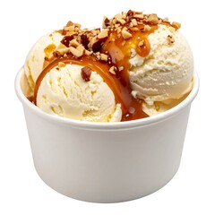 Creamy vanilla scoops topped with caramel and chopped nuts in a white cup
