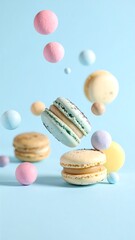 Obraz premium Pastel-colored macarons float with matching spheres against a baby-blue backdrop
