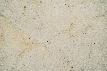Textura de pared de cemento envejecido con grietas y manchas naturales