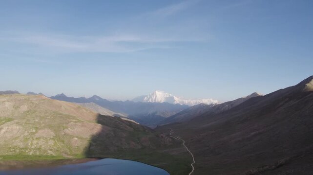 Sheosar Lake on Deosai Plateau with Nanga Parbat and surrounding peaks in the background