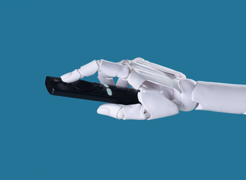 The AI Remote: Robotic Hand Holding a Control Device