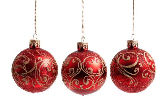Three shiny red baubles with gold ornate patterns on black