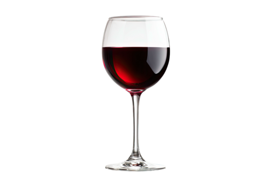 A glass of rich red wine on a black background