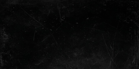 Old black toned grunge rough scratched textured wall, Empty surface of Black stone or grunge charcoal black board or chalk board texture, grainy Marble Black Texture Background. © Daiyan