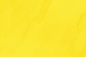 A sheet of yellow watercolor paper texture as a background