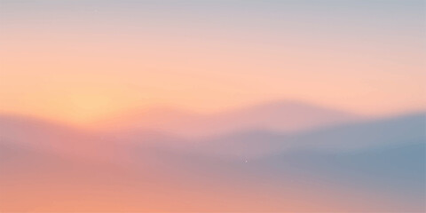 Orange and red light from a majestic sunset or tranquil sunrise illuminates a dramatic mountain landscape with wispy clouds in the sky