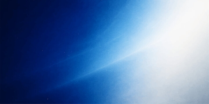 Beautiful abstract blue background with fluffy white clouds and bright summer sunlight