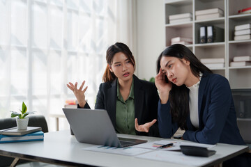 Businesswomen having argument struggling with work problems