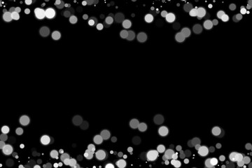 Monochrome bokeh dots backdrop on black for neutral themes and abstract designs