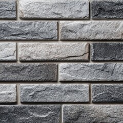 Exclusive photo of closeup texture of a grey brick wall with rough stone surface.