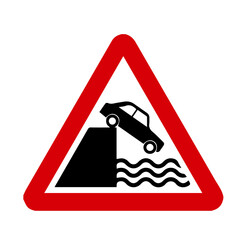 River exit warning signs warn drivers that the road ahead ends at a water_s edge, such as a pier, riverbank, canal, or pond.