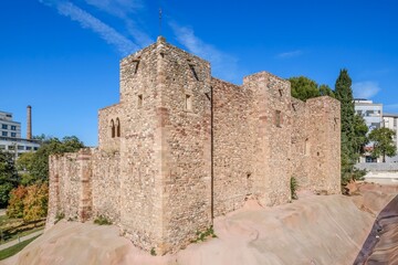 Fototapeta premium Cartoixa Castle Stone Walls and Tower, Medieval Ruins, Terrassa, Barcelona
