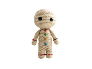 Beige crocheted voodoo doll wrapped in yarn with colorful button decorations and beaded anklets, isolated on a transparent background