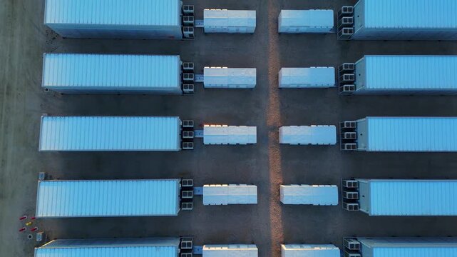 Symmetrical top-down view of battery units in energy storage facility, Moss Landing, 2,500 MWh, California, USA
