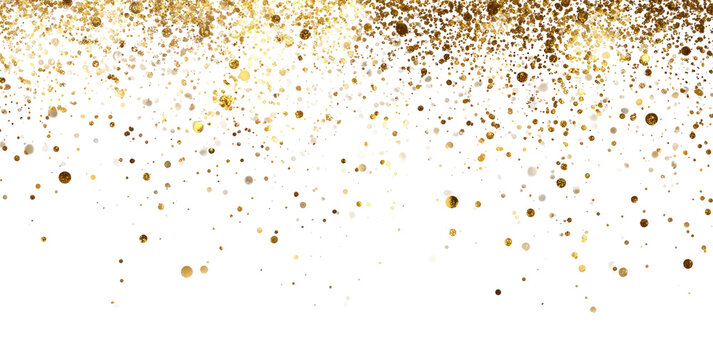 Golden glittering particles falling against a dark background
