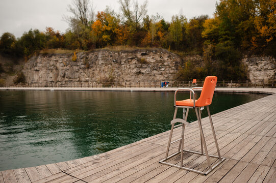 Empty Lifeguard Chair by Autumn Lake