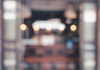 Soft focused image of cafe or shop interior with glowing circular bokeh lights abstract background