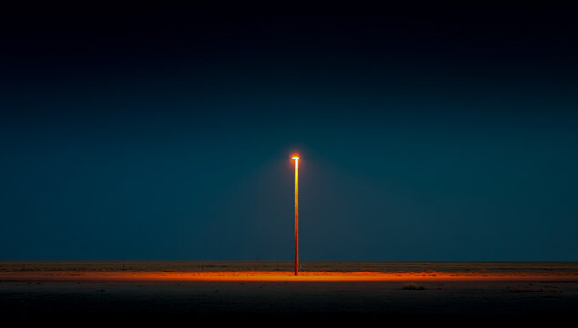 A lone rocket ascends into the dark night sky leaving a bright fiery trail behind it - Powered by Adobe
