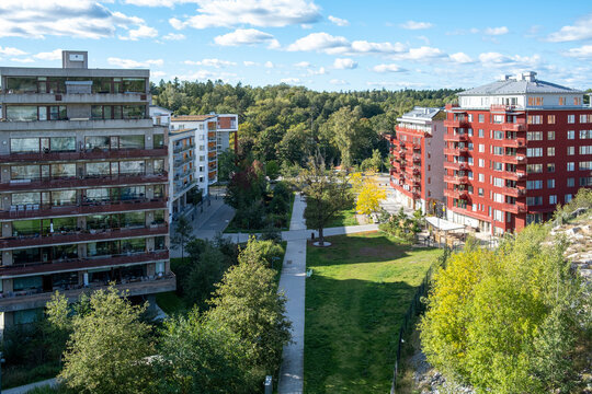 Aerial view of urban green residential architecture integrated within eco sustainable landscape of Norradjurgardsstaden district in Stockholm with modern design and vegetation details
