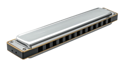 Silver harmonica showing reed slots against a dark background