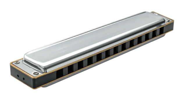 Silver harmonica showing reed slots against a dark background