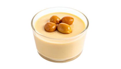 Dessert caramel pudding topped with four glazed whole nuts