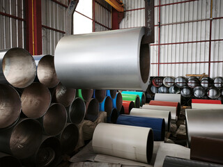 Industrial metal tubes storage factory warehouse photography indoor close-up material handling