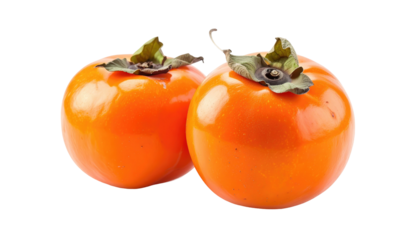 Two ripe, orange persimmons against a dark backdrop