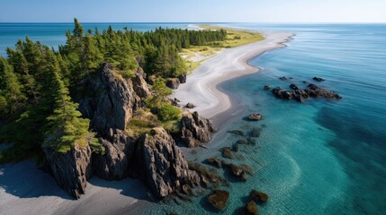 Lush Green Peninsula Meets Crystal Blue Ocean Waters Under a Clear Sunny Sky Scenic Aerial View