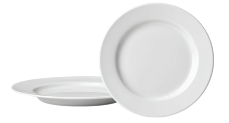 Two clean, white dinner plates on a black background