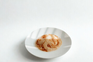 Delicious bowl of pasta with a perfectly cooked egg on top